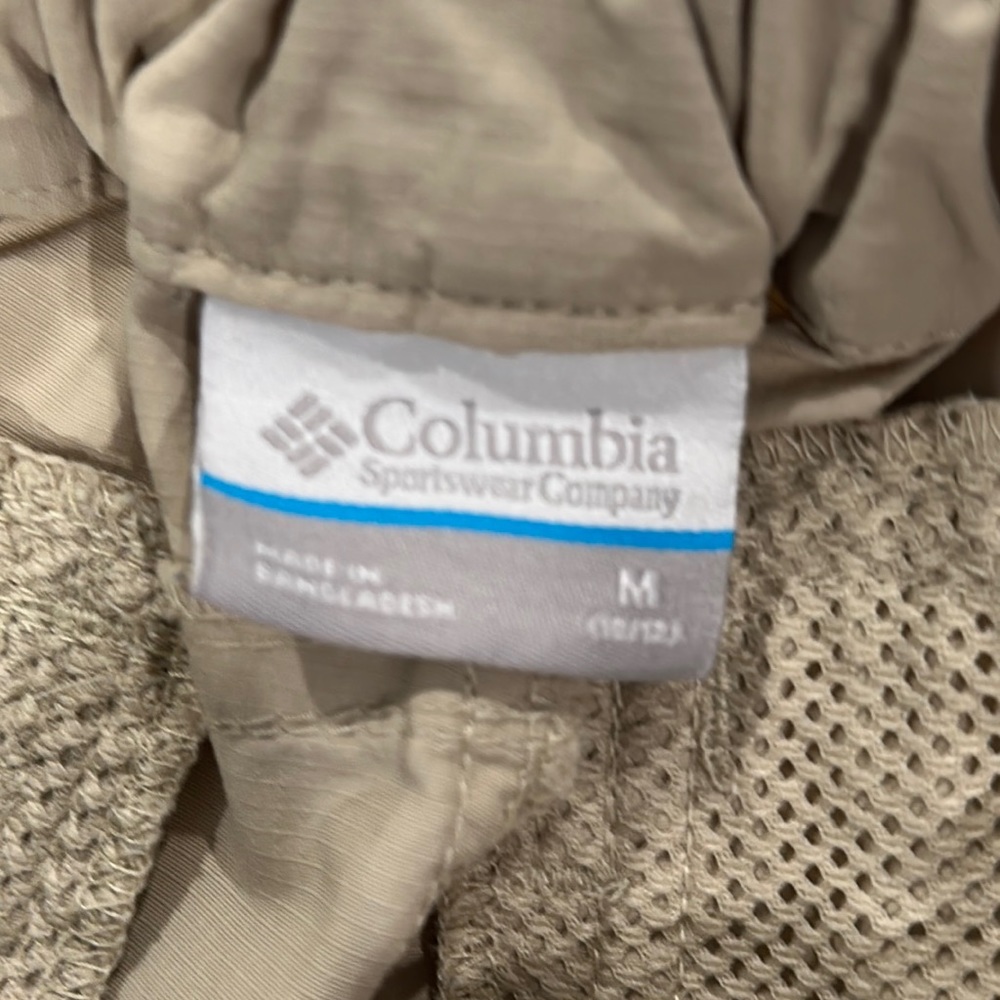 Columbia khaki pants that can transform to shorts with a zipper.